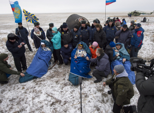 NASA photo by Bill Ingalls Expedition 41 Flight Engineer Alexander Gerst of the European Space Agency, left, Commander Max Suraev of the Russian Federal Space Agency, center, and NASA Flight Engineer Reid Wiseman, sit in chairs outside the Soyuz TMA-13M capsule just minutes after they landed in a remote area near the town of Arkalyk, Kazakhstan Monday, Nov. 10. Suraev, Wiseman and Gerst returned to Earth after more than five months onboard the International Space Station where they served as members of the Expedition 40 and 41 crews.