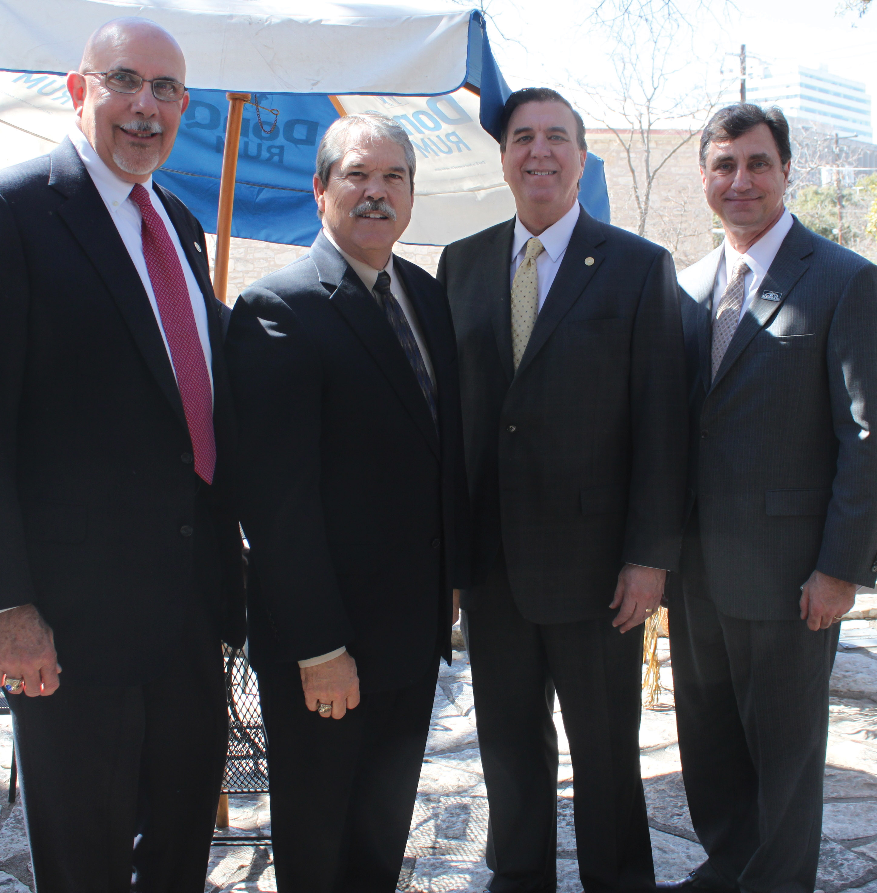 Mayors Glenn Royal of Seabrook, right, and Michel Bechtel of Morgan’s Point, left, talk about some of the Bay Area’s needs with State Sen. Larry Taylor and State Rep. Dennis Paul during visit to the Texas Legislature by the Clear Lake and League City Chambers and Bay Area Houston Economic Partnership.