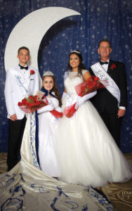 2017 Lunar Rendezvous Queen Madelyn Claire Emilia Chidester poses for a photo with King Kevin Duke, right, Queen Alternate Alexa Rae Trevino and Captain Alexander Edward Struss at the Coronation Ball in Galveston. They will reign over next year’s festival. Photo by J. Pamela Photography