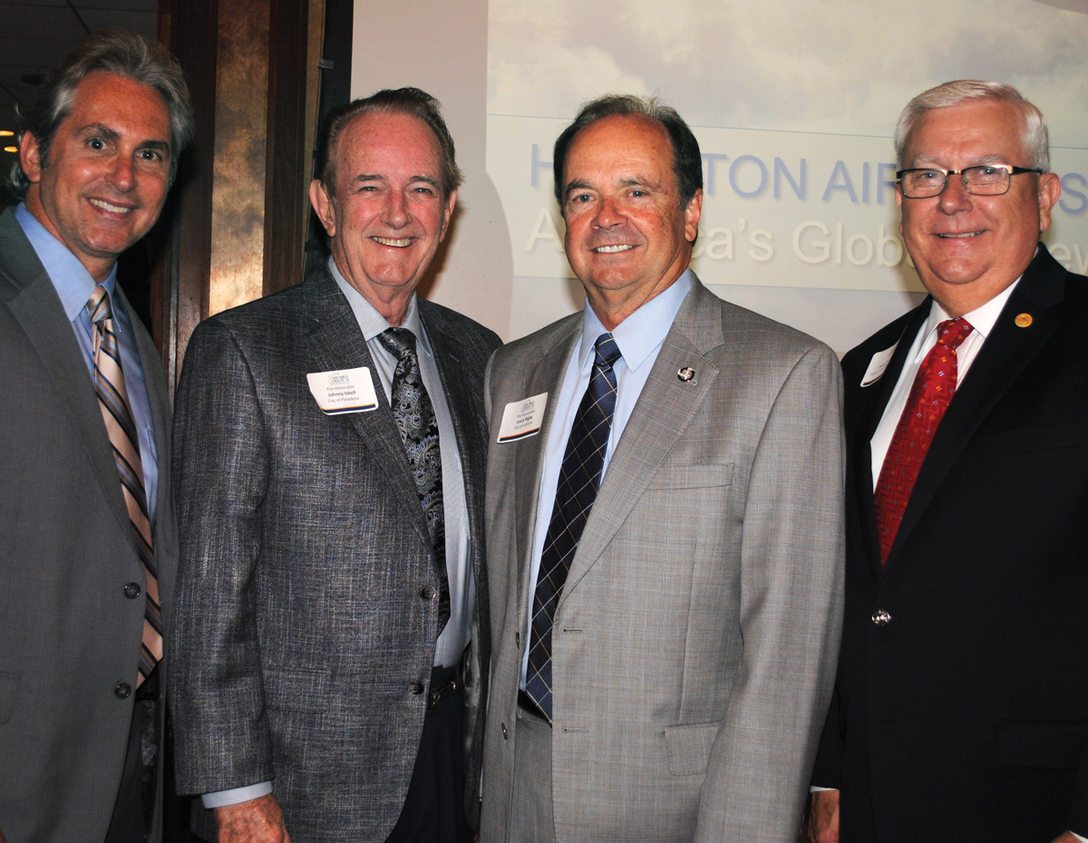 Pasadena City Councilman Jeff Wagner and Mayor Johnny Isbell, from left, arrive at the Bay Area Houston Economic Partnership luncheon at Lakewood Yacht Club in Seabrook, along with La Porte Mayor Louis Rigby and Port Commissioner John Kennedy of Nassau Bay to hear Houston Airport System Director Mario Diaz.